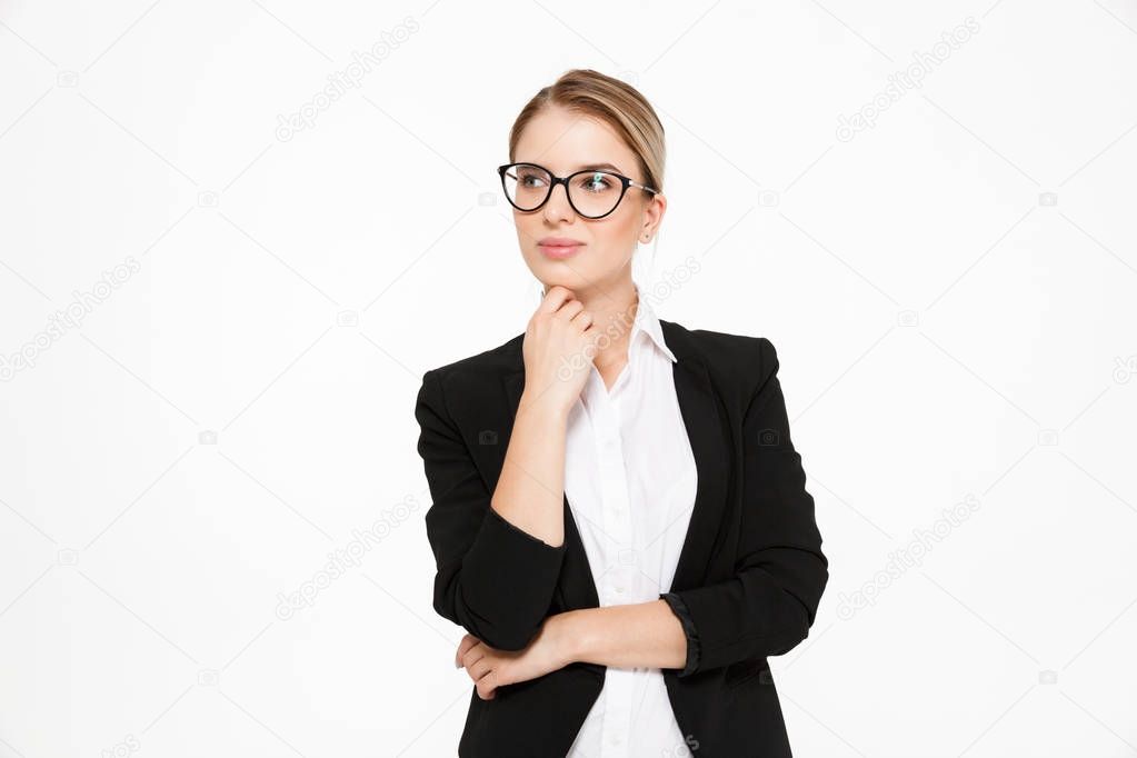 Attractive young blonde business woman in eyeglasses