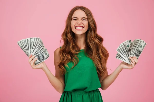 Portrait of a satisfied happy woman winner with long hair — Stock Photo, Image