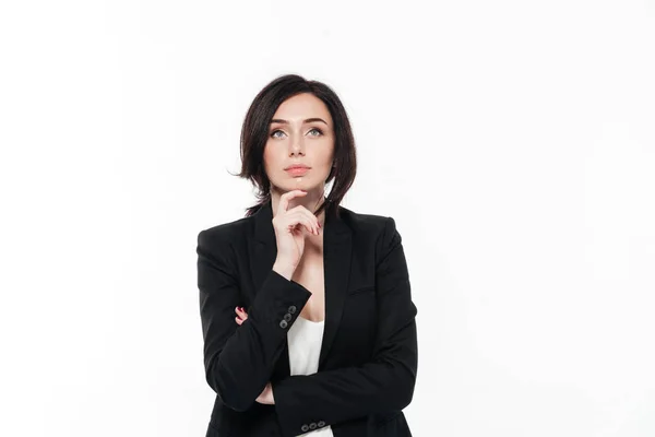 Portrait of a pretty thoughtful businesswoman in suit — Stock Photo, Image