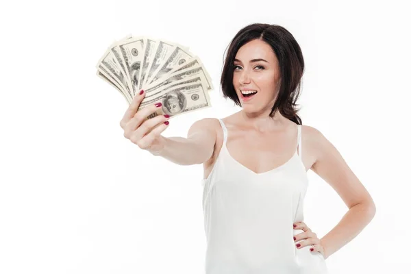 Retrato de una mujer feliz emocionada mostrando un montón de dinero —  Fotos de Stock