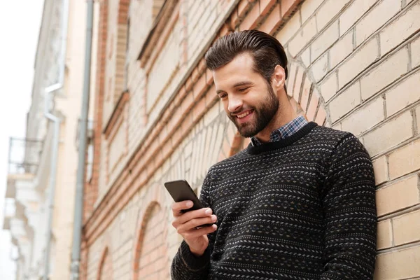 Portrait of a happy handsome man in sweater — Stock Photo, Image