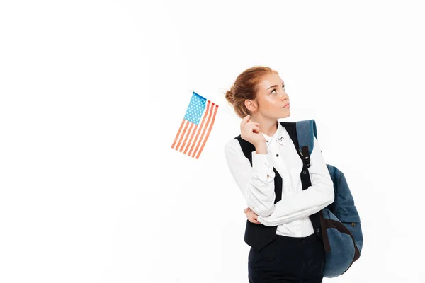 Ernstig nadenkend gigner student vrouw met rugzak met Usa vlag — Stockfoto