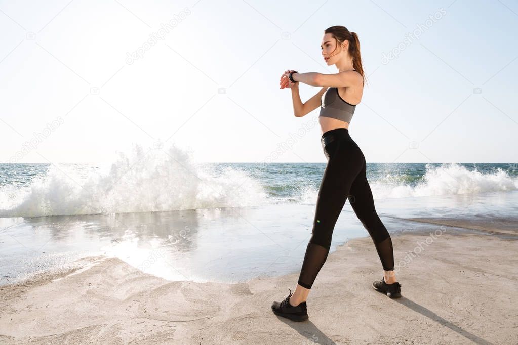 Full-length photo of young healthy woman with perfect body check