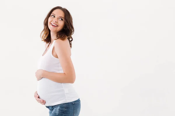 Pregnant woman standing isolated — Stock Photo, Image