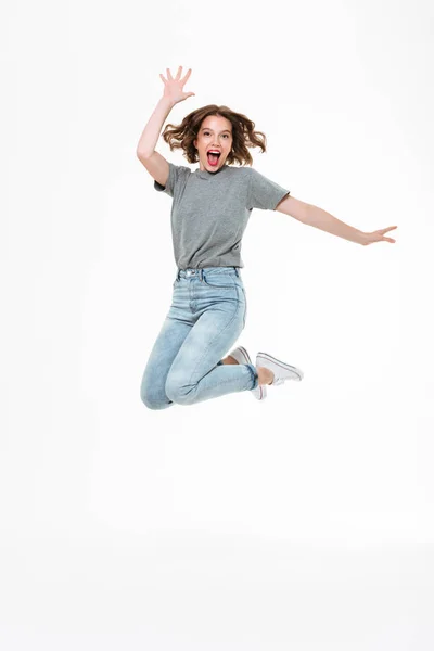 Emocionado joven caucásico dama saltando — Foto de Stock