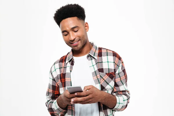 Portrait of a smiling young african man — Stock Photo, Image