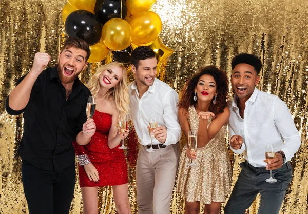 Portrait of a excited happy multiracial group of friends celebrating — Stock Photo, Image