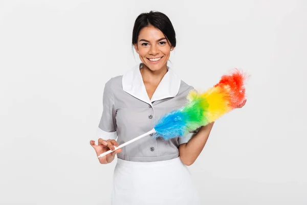 Portret van vrij lachende vrouw in uniform houdt van kleurrijke dus — Stockfoto