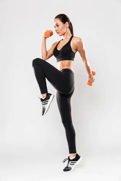 Full length portrait of a healthy young asian fitness woman — Stock Photo, Image