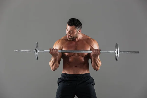 Portrait of a muscular motivated shirtless male bodybuilder — Stock Photo, Image