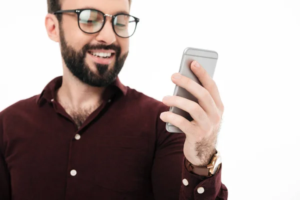 Close up portrait of a cheerful young man in eyewear — Stock Photo, Image