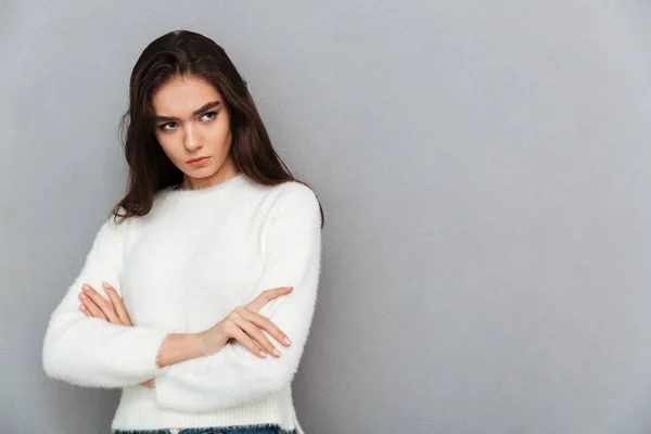 Close-up photo of upset brunette girl in soft sweater standing w — Stock Photo, Image