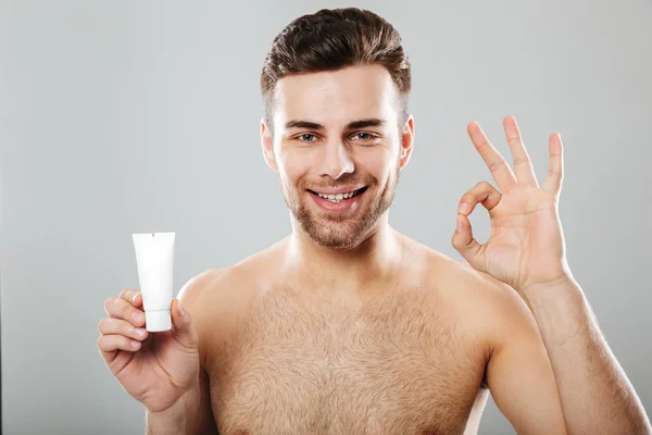 Beauty portrait of a smiling half naked man — Stock Photo, Image