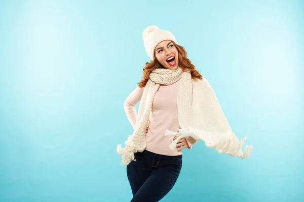 Portrait of a happy girl dressed in hat and scarf — Stock Photo, Image