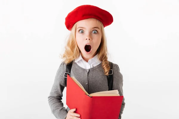 Retrato de una colegiala impactada vestida de uniforme —  Fotos de Stock