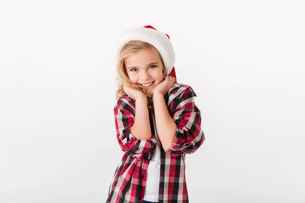 Πορτρέτο του ένα υπέροχο κοριτσάκι ντυμένο στο Χριστουγεννιάτικο καπέλο — Φωτογραφία Αρχείου