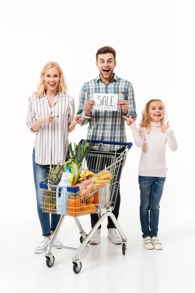 Full length portrait of a surprised family — Stock Photo, Image