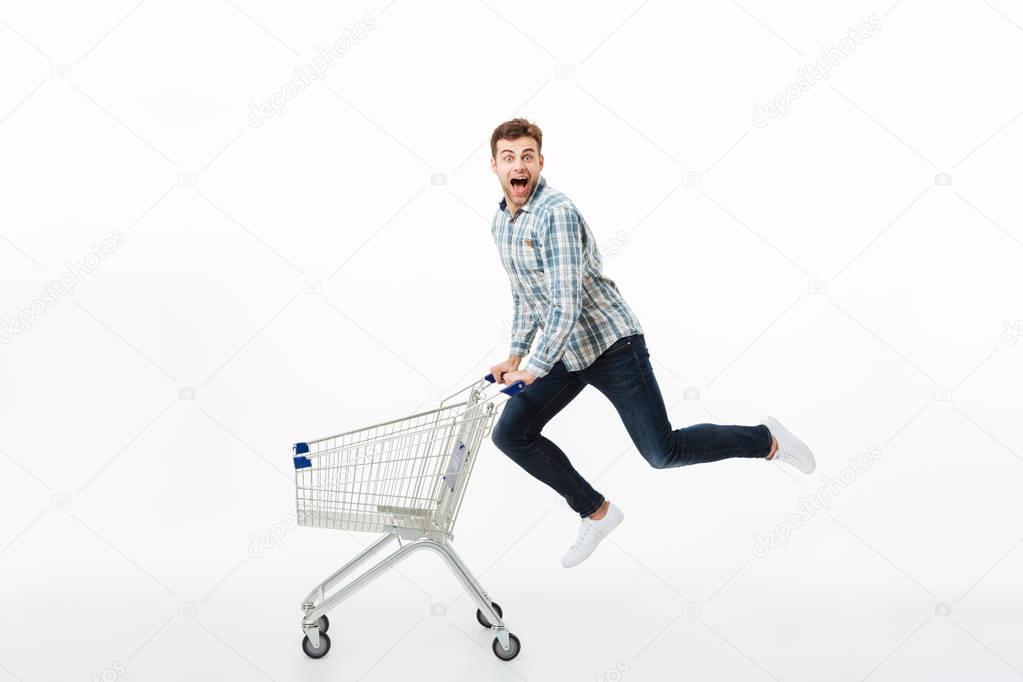 Full length portrait of a cheerful man jumping