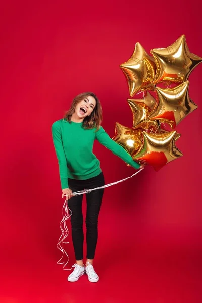 Mutlu genç kadın holding Balonlar oldukça. — Stok fotoğraf