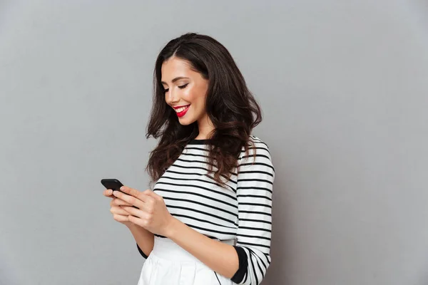 Portrait of a smiling girl standing — Stock Photo, Image