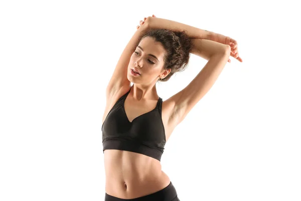 Sensuele fitness vrouw aan het warmrijden in studio en op zoek weg — Stockfoto