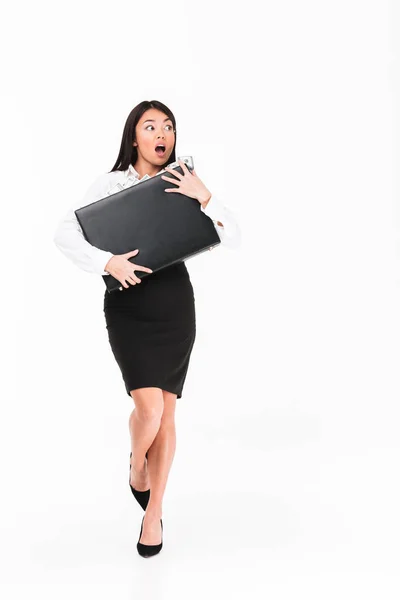 Full length portrait of an astonished asian businesswoman — Stock Photo, Image