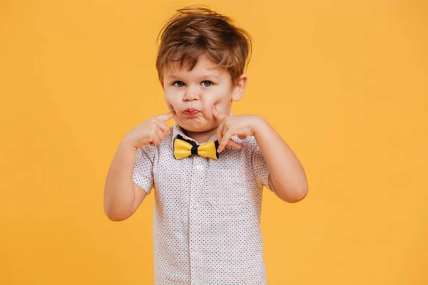 Funny little boy child standing isolated — Stock Photo, Image