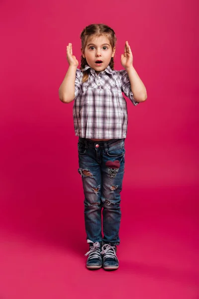 Shocked little girl child standing isolated — Stock Photo, Image