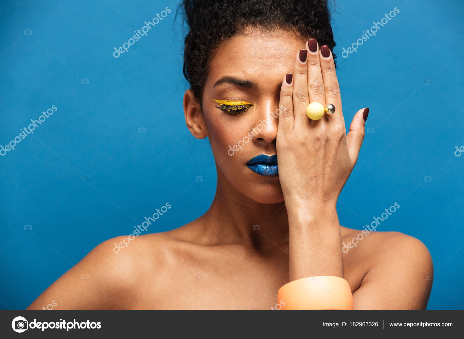 Beauty Photo Of Relaxed Mixed Race Woman With Colorful Cosmetics