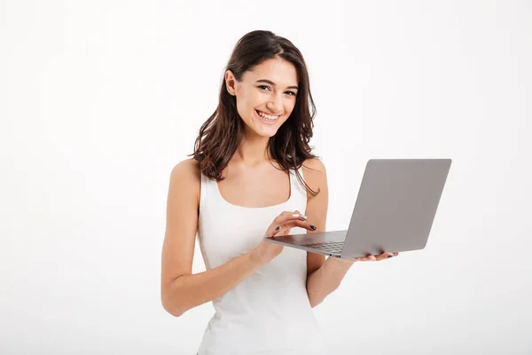 Portrait of a smiling girl dressed in tank-top — Stock Photo, Image