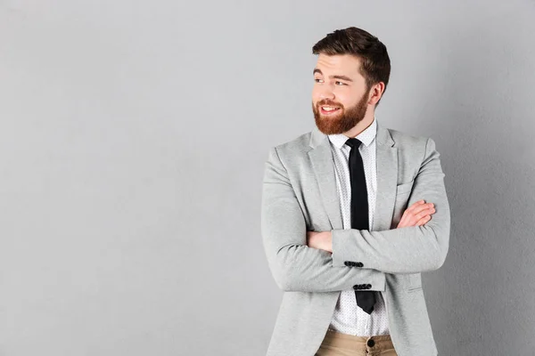 Retrato de un hombre de negocios sonriente vestido de traje — Foto de Stock