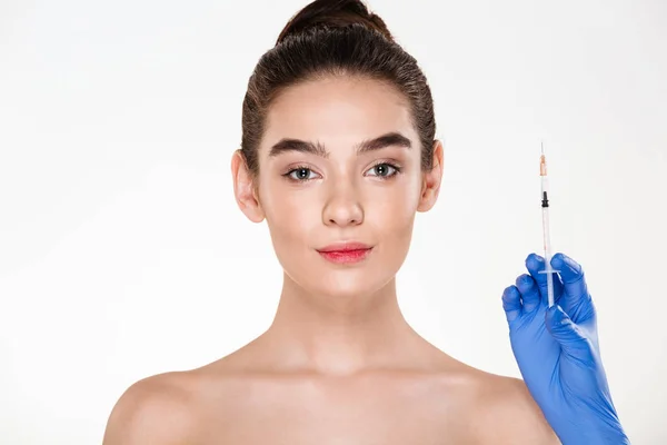 Image of pretty woman preparing for beauty injection made by doc — Stock Photo, Image