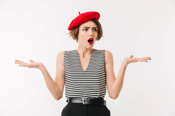 Retrato de una mujer confusa con boina roja — Foto de Stock