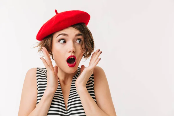 Portret van een geschokt vrouw gekleed in rode baret — Stockfoto