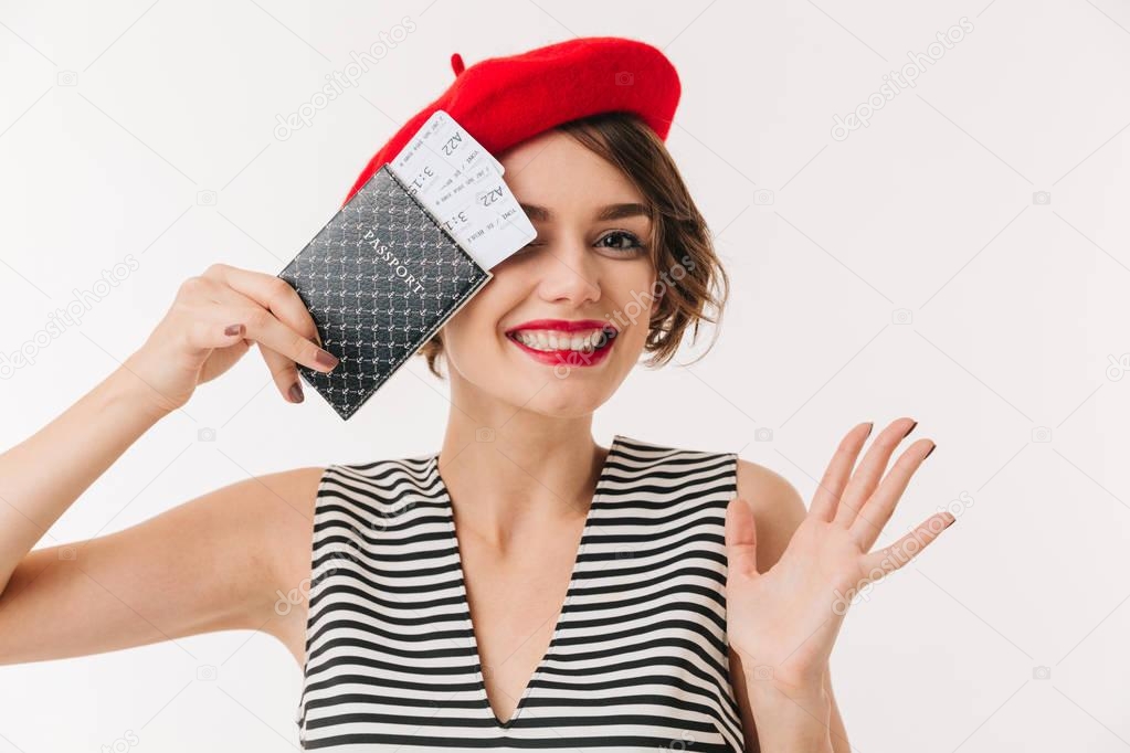 Portrait of a cheery woman wearing red beret