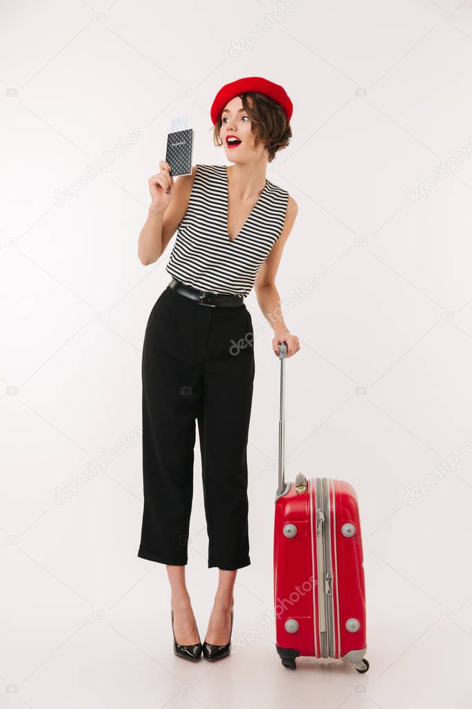 Full length portrait of a cheerful woman