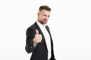 Yakışıklı, olgun bir iş adamının portresi.