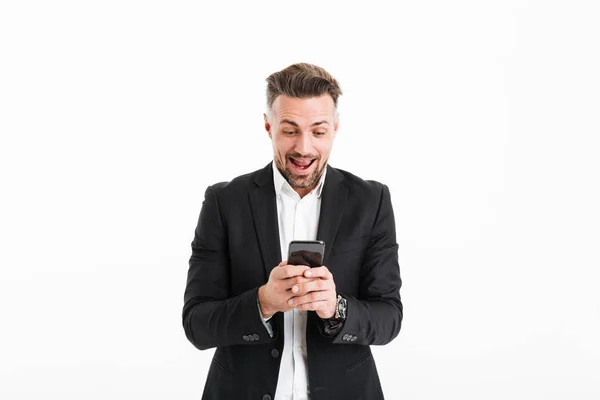 Portret van een vrolijke zakenman gekleed in pak — Stockfoto