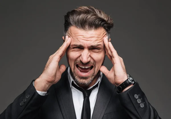 Närbild porträtt av en stressad mogen affärsman — Stockfoto