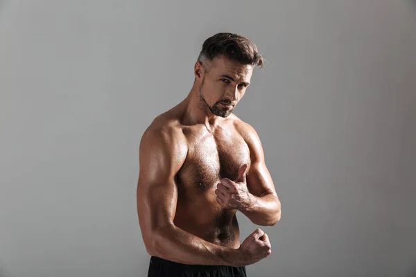 Close up portrait of a strong mature shirtless sportsman — Stock Photo, Image