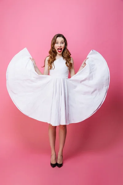 Happy young lady standing isolated — Stock Photo, Image