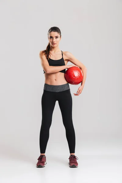 Full-length photo of serious concentrated sportswoman looking on — Stock Photo, Image