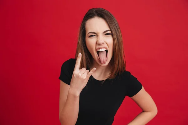 Retrato de una chica loca mostrando cuernos hasta gesto — Foto de Stock