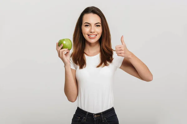 Portret zdrowej, młodej kobiety, gospodarstwa zielone jabłuszko — Zdjęcie stockowe