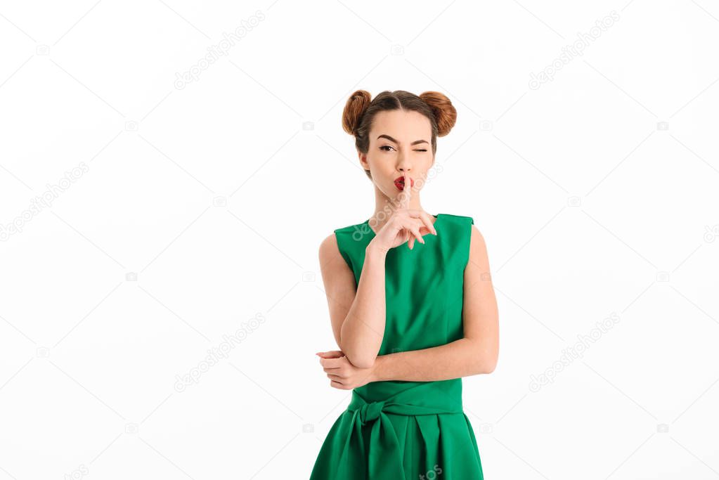 Portrait of a lovely young girl dressed in green dress