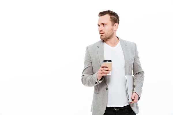 Hombre de negocios guapo bebiendo café. — Foto de Stock