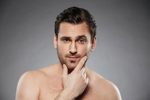 Close up portrait of half naked bearded man looking at camera wi — Stock Photo, Image