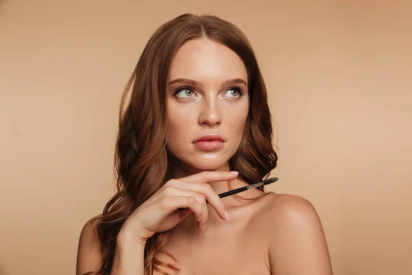 Beauty portrait of mystery ginger woman with long hair — Stock Photo, Image