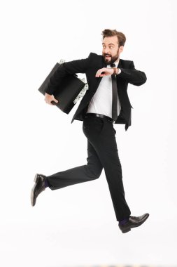 Genç işadamı çalıştıran bavulla heyecanlı