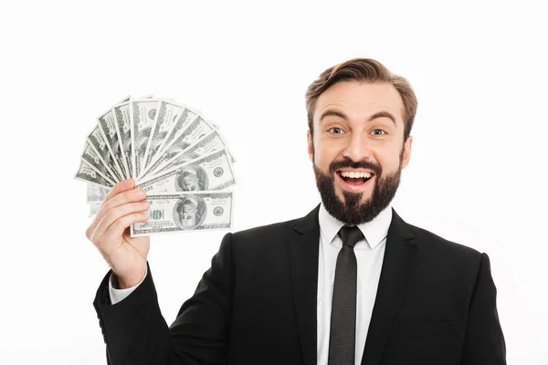 Portrait of delighted rich male millionaire holding fan of money — Stock Photo, Image